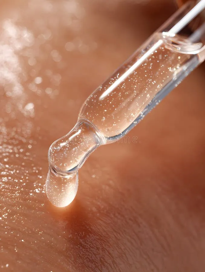 extreme-close-up-skincare-dropper-filled-milky-serum-inside-transparent-glass-tube-releasing-droplet-onto-smooth-400521805 Sự thư giãn trong lúc thiền định giúp các dưỡng chất thẩm thấu sâu và hiệu quả hơn vào tế bào da